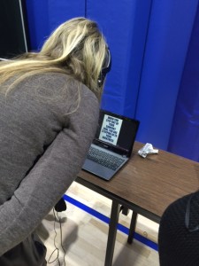 A teacher listens to a student-made video about why she is here to change the world!